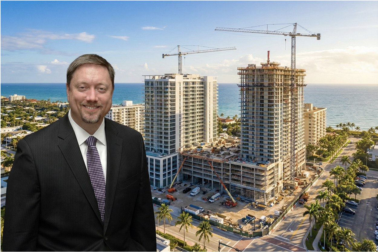 Jason C. Maier of Maier Law in Palm Beach next to a large construction project.